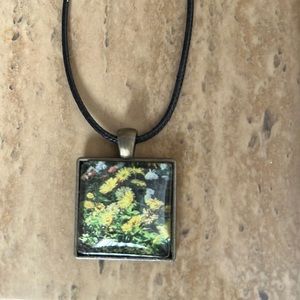 Square pendant necklace with yellow flowers